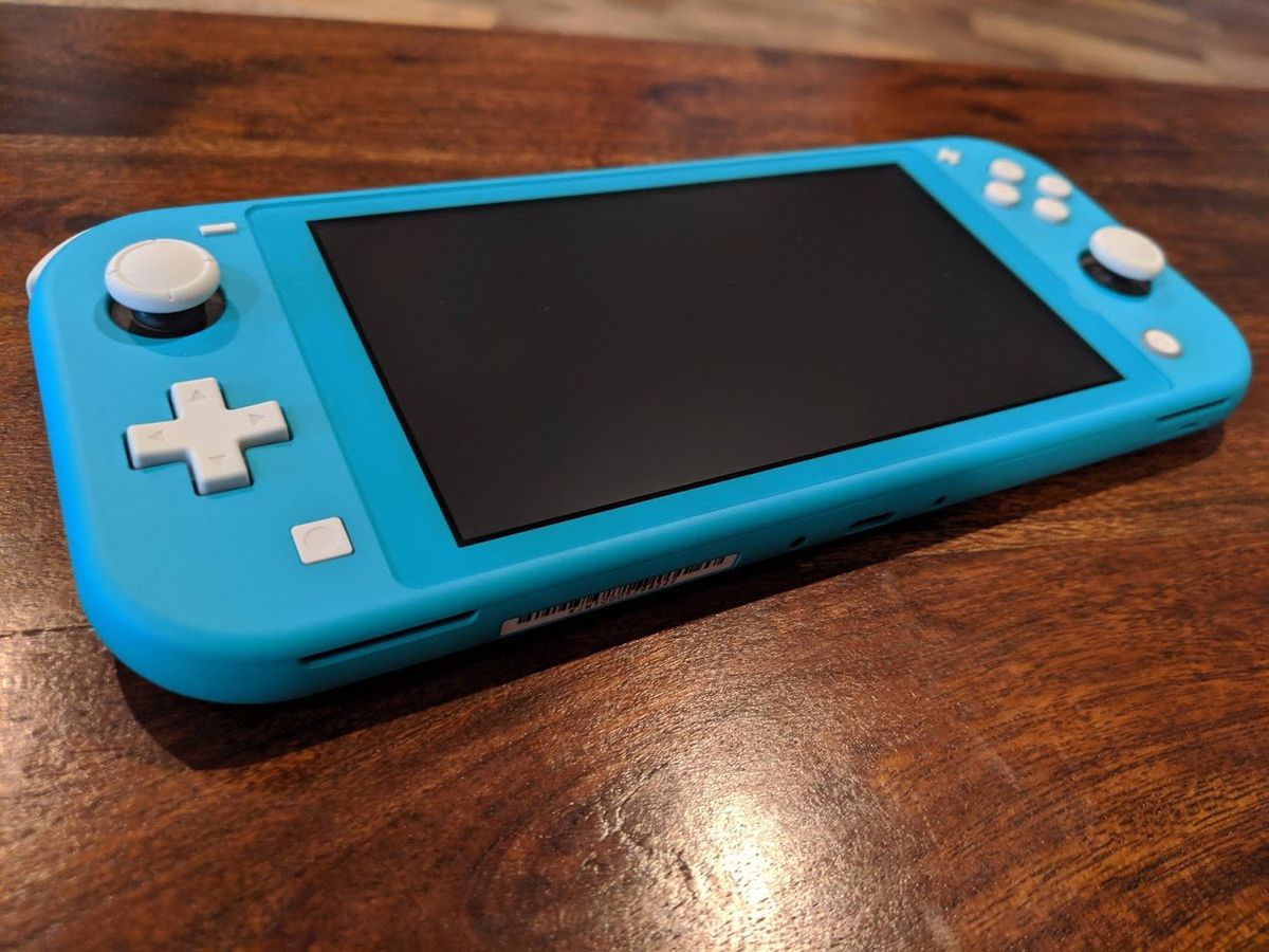 nintendo switch lite console with games