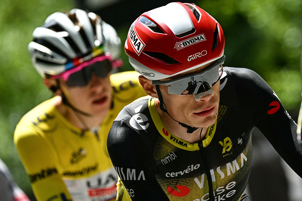UAE Team Emirates - XRG team's Slovenian rider Tadej Pogacar wearing the overall leader's yellow jersey and Team Visma - Lease a bike team's Danish rider Jonas Vingegaard cycles in the ascent of Col de la Madeleine during the 18th stage of the 112th edition of the Tour de France cycling race, 171.5 km between Vif and Courchevel Col de la Loze, in the Alps, southeastern France, on July 24, 2025. (Photo by Loic VENANCE / AFP)