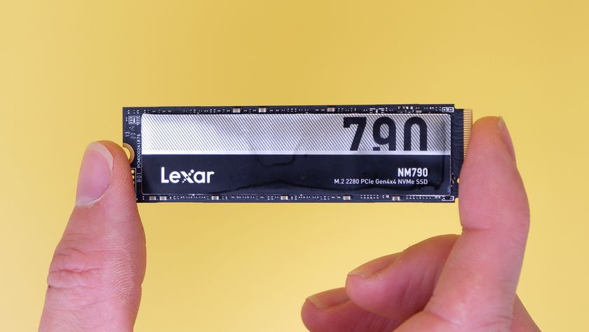 Lexar NM790 SSD on a yellow background with packaging.