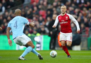 Jack Wilshere (right) in action for Arsenal