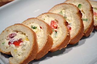 A baguette stuffed with veggies