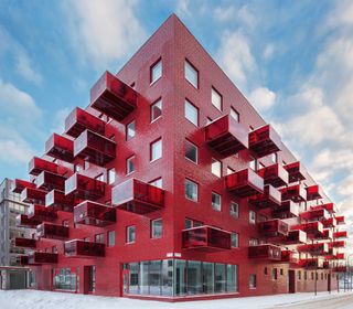 Red housing block with red balconies