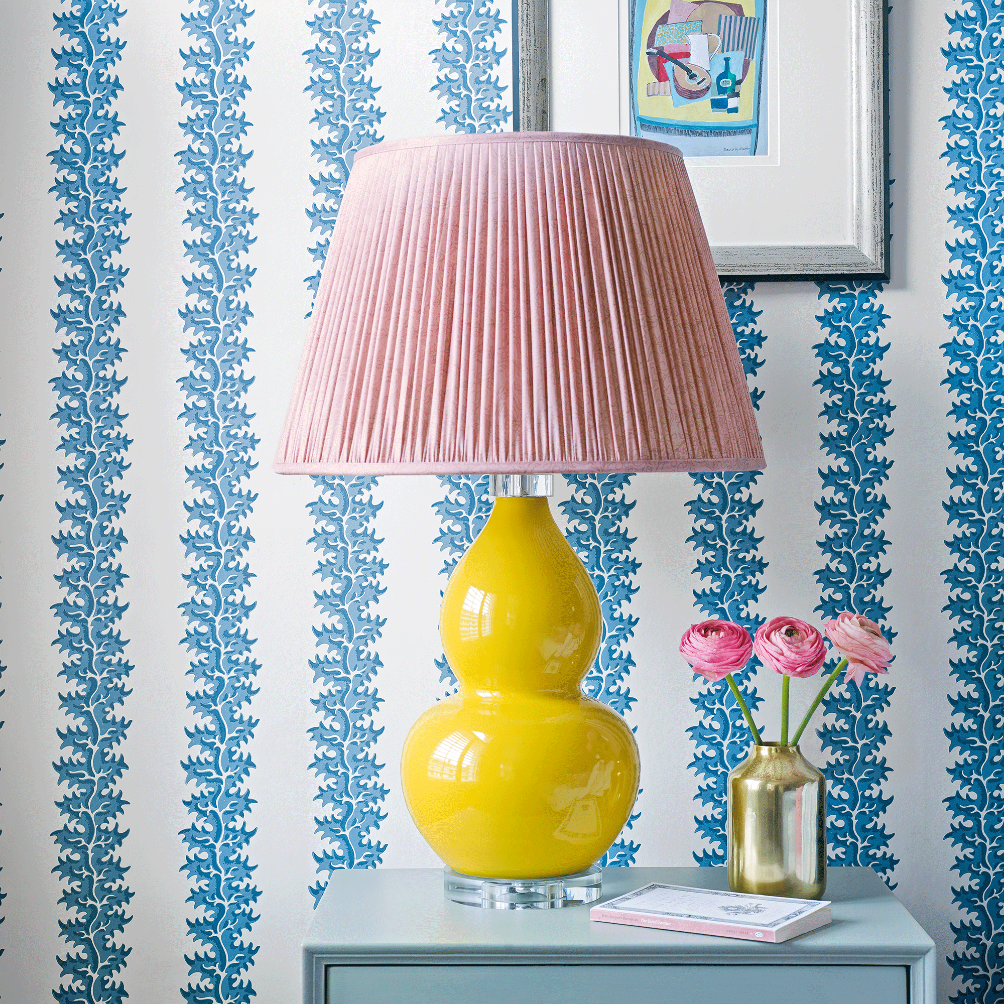 Blue wallpaper with yellow lamp