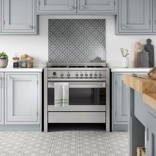 kitchen room with printed flooring and kitchen cabinets