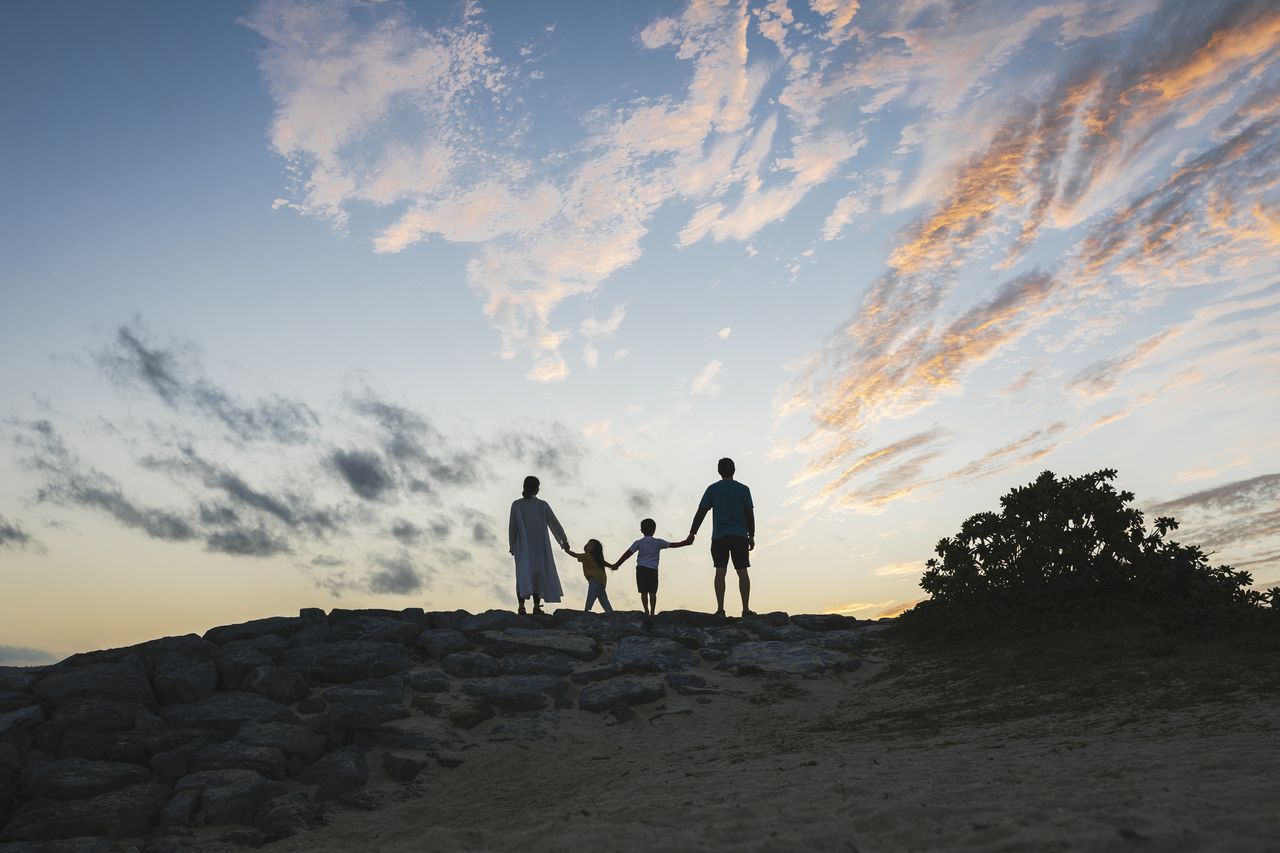 Family at sunset.