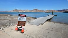 A sign warning about low water levels at Lake Mead, Nevada, August 2026. In July, the water levels of Lake Powell and Lake Mead, the two largest US reservoirs, reached their lowest levels in 60 years.