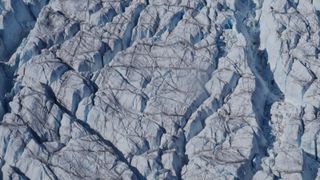 Cracks in Greenland ice sheet.