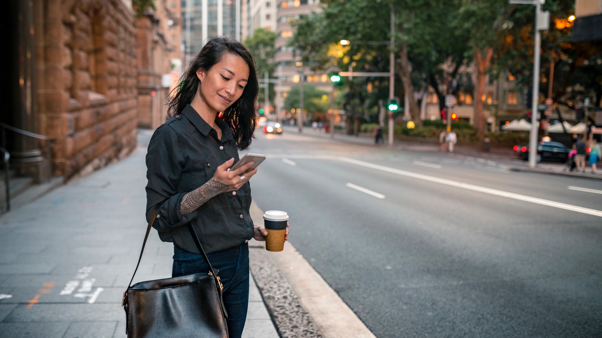 Young woman using smartphone in Sydney