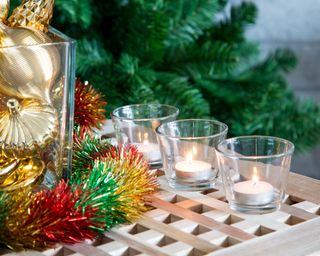 Christmas decorating scheme with tea lights in glasses