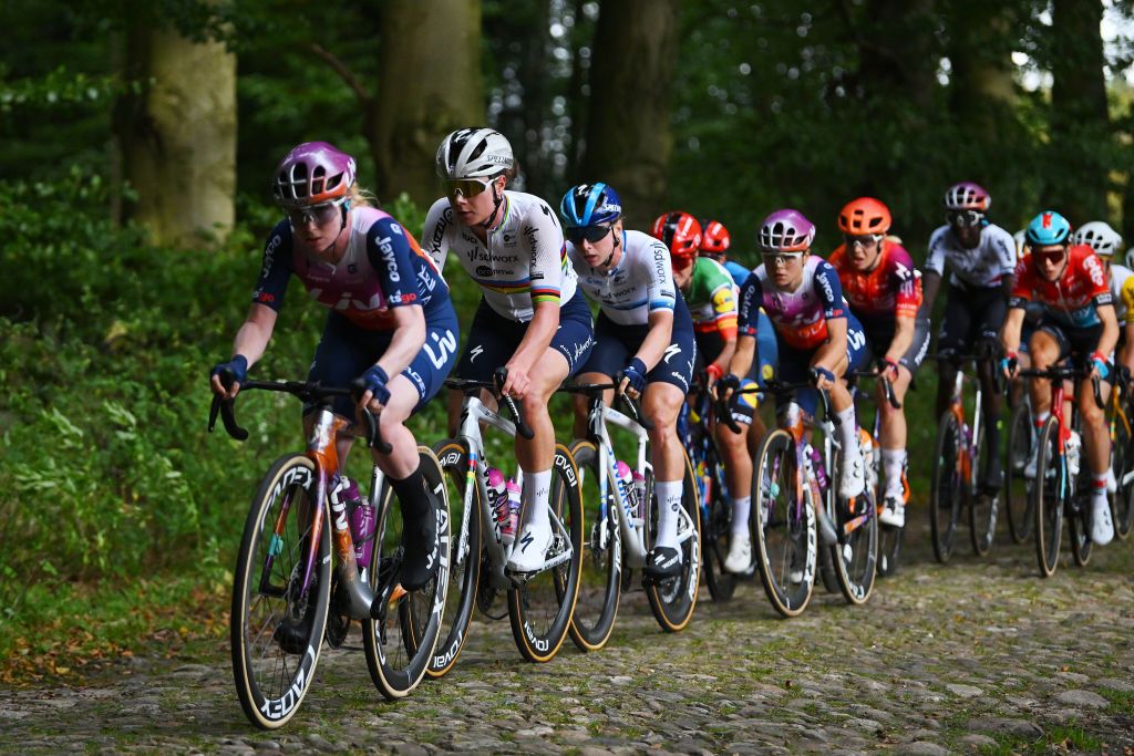 ASSEN NETHERLANDS OCTOBER 09 LR Lotte Kopecky of Belgium Lorena Wiebes of The Netherlands and Team SD Worx Protime compete during the 26th Simac Ladies Tour 2024 Stage 2 a 1548km stage from Coevorden to Assen on October 09 2024 in Assen Netherlands Photo by Luc ClaessenGetty Images