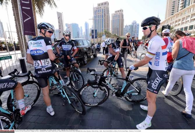 Mark Cavendish with his team after failing to make it to the sprint