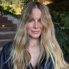 Kristen Bell with lived-in blonde hair and darker roots