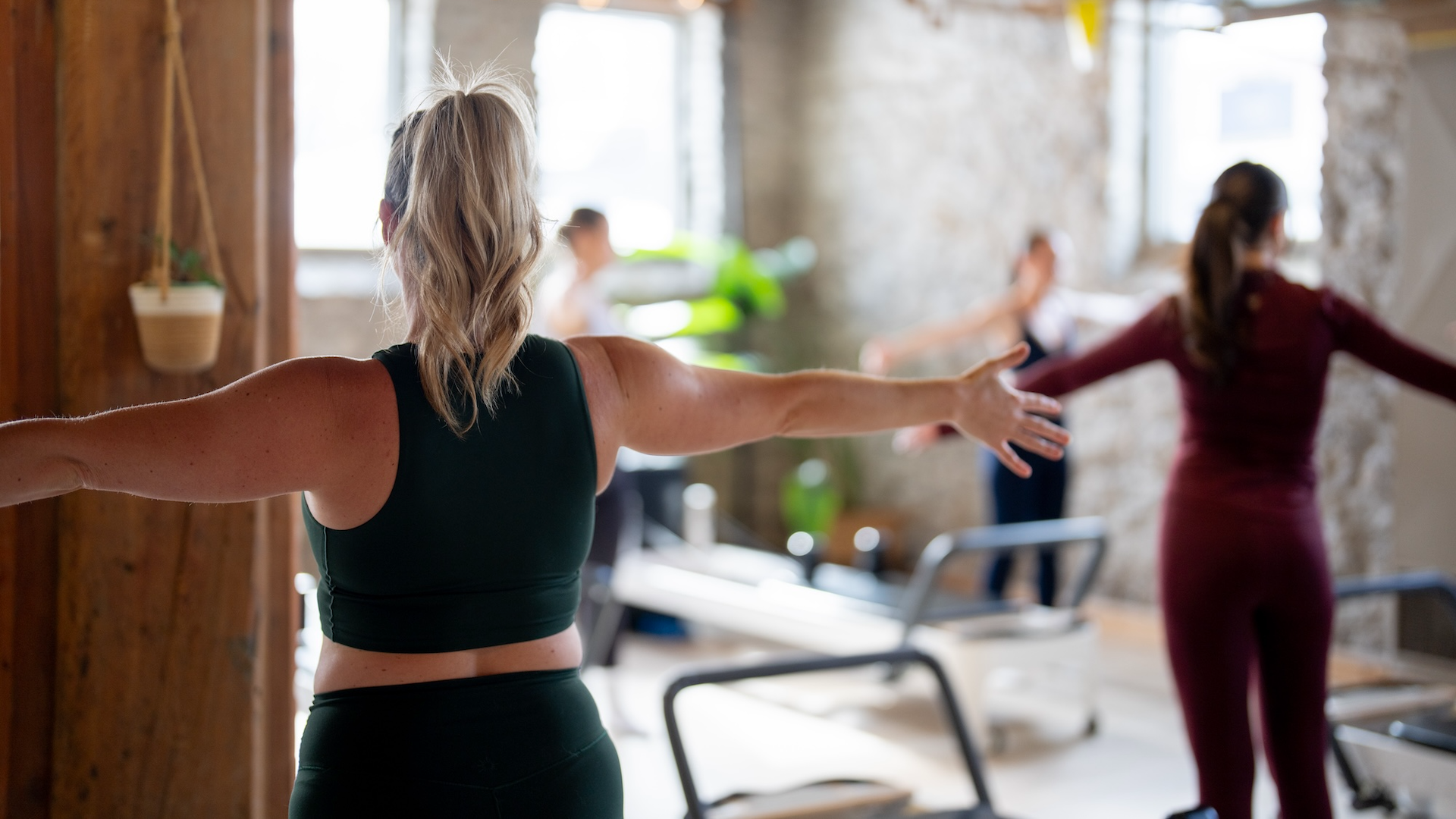 Class of women doing Pilates