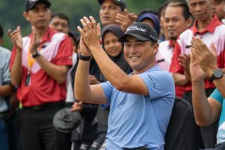 Canada's Richard T. Lee applauds the crowd after winning the 2024 Indonesian Masters