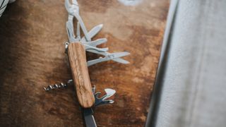 Wooden multitool on a table