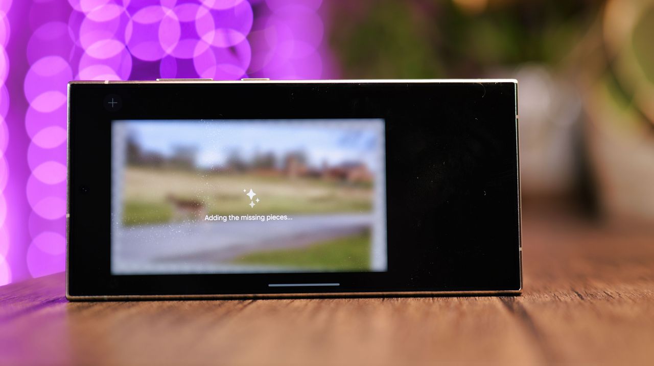 Photo displayed on a Samsung Galaxy S24 Ultra phone screen with purple lights blurred in the background