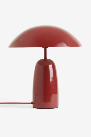 Red H&M Home lamp.