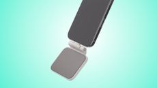 8BitDo FlipPad controller on an iPhone