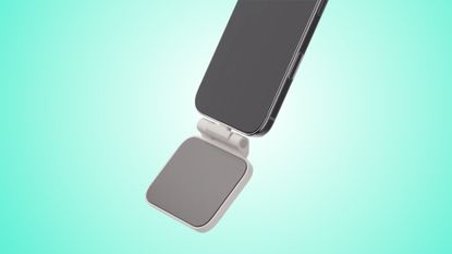 8BitDo FlipPad controller on an iPhone