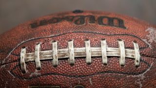 Close up image of an American football