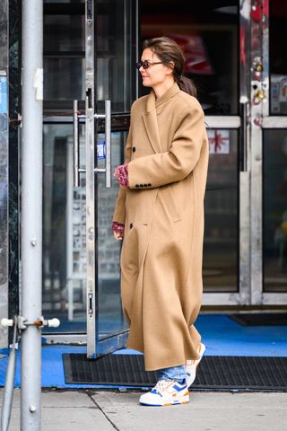 Katie Holmes out in NYC weaing a camel coat