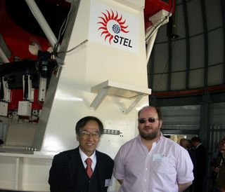 Professors Yasushi Muraki of Nagoya University (left) and David Bennett of the University of Notre Dame (right) in front of the MOA-II 1.8m telescope at the Mt. John University Observatory located on New Zealand's South Island. Muraki's group at Nagoya University built the telescope and its wide field-of-view camera, which is used for the MOA collaboration's gravitational microlensing survey involving Bennett and Muraki, as well as a number of other collaborators from Japan and New Zealand.
