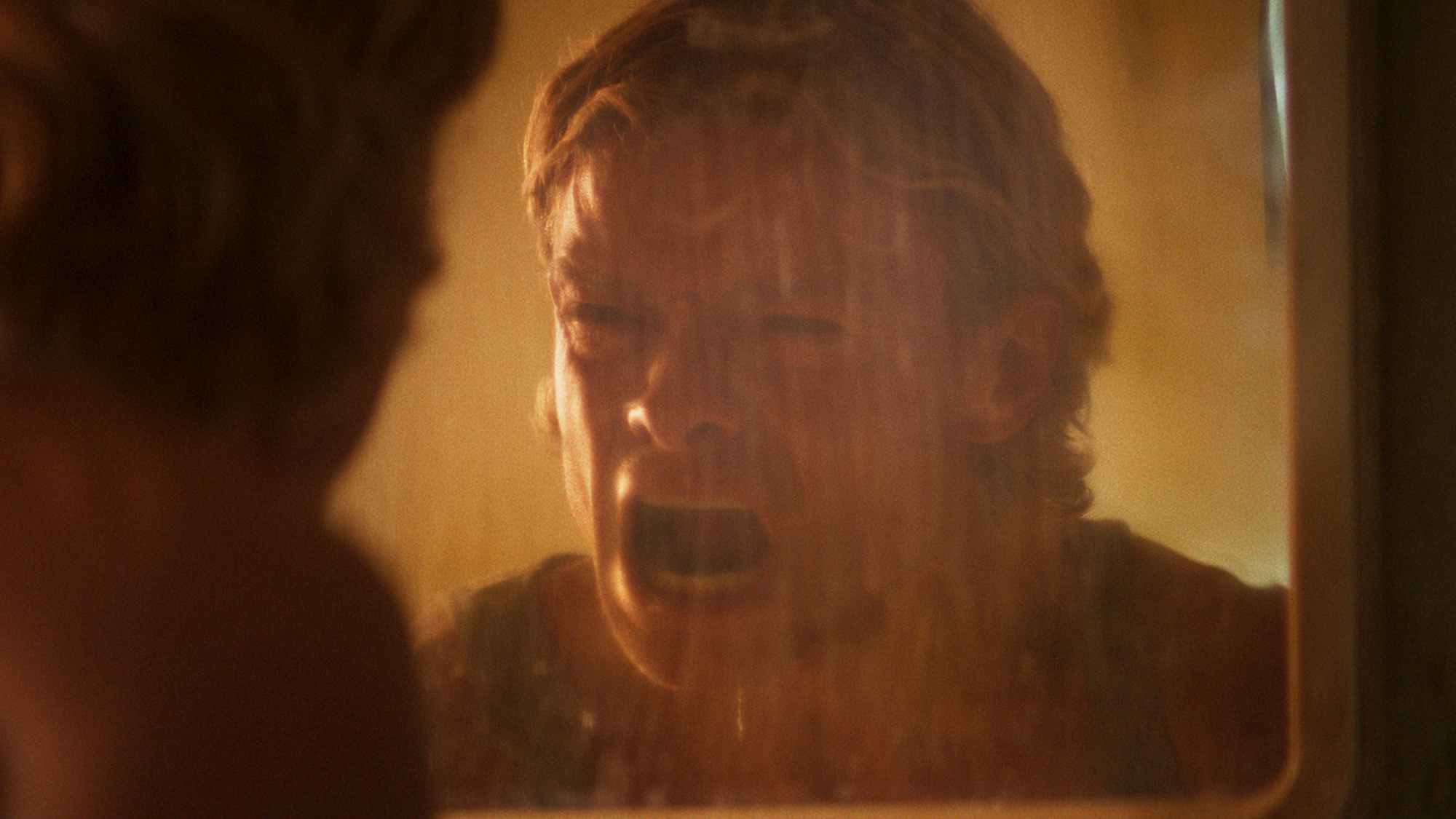 Tom Rhys Harries' Matt Hagen screaming into a mirror in DC Studios' Clayface movie