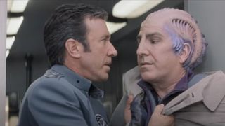 Galaxy Quest still showing Tim Allen grabbing Alan Rickman on a sci-fi ship
