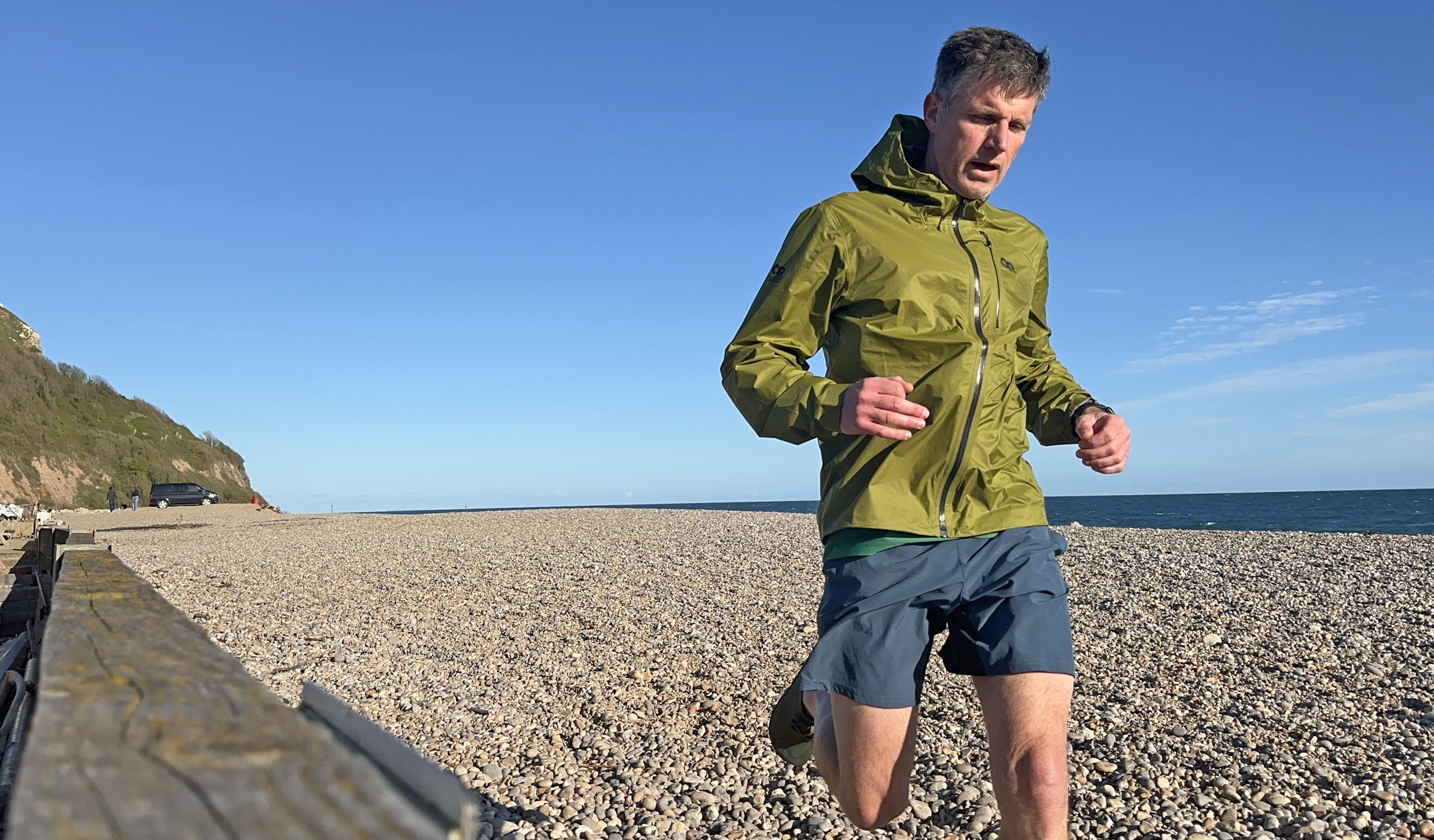 Runner wearing the OR Helium UL Jacket