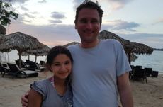 Arya Lloyd on a beach with her father who has appealed for a stem cell donor to save her life