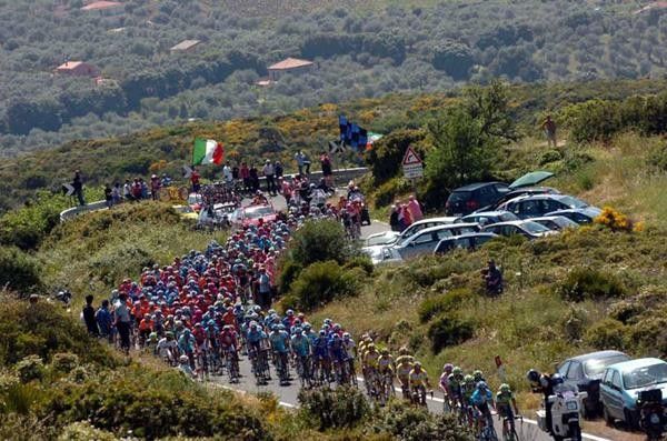 The riders cover the twisty roads of Sardinia.