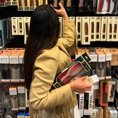 Julia Rabinowitsch, founder of The Millennial Decorator, at Zitomer's wearing a fringe leather Ralph Lauren jacket. 