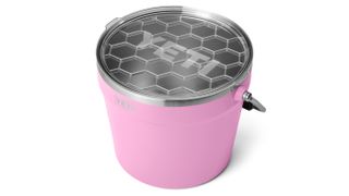 Pink YETI Rambler drinks bucket on white background