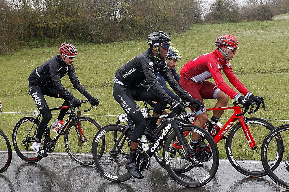 Riders were bundled up as the faced rain, ice rain at Pais Vasco