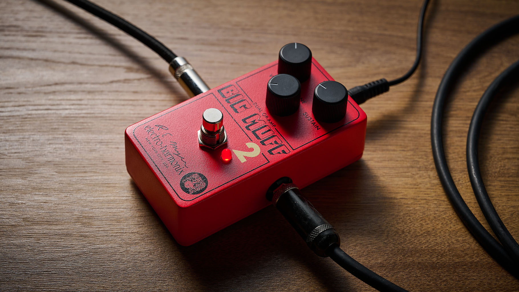 Electro-Harmonix Big Muff Pi 2 Dual Op-Amp Fuzz is built from a lost schematic that's 50 years old but the form factor is familiar for contemporary EHX stompboxes, a three-knob fuzz, red enclosure.