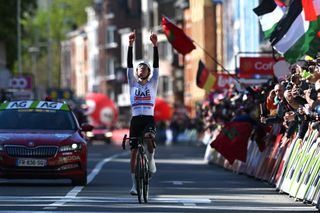 Tadej Pogačar celebrates winning Liège-Bastogne-Liège 2024