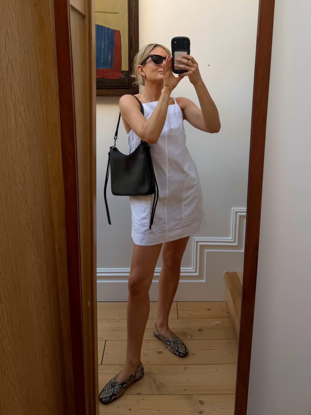 @lucywilliams02 wears white mini dress snake print ballet flats
