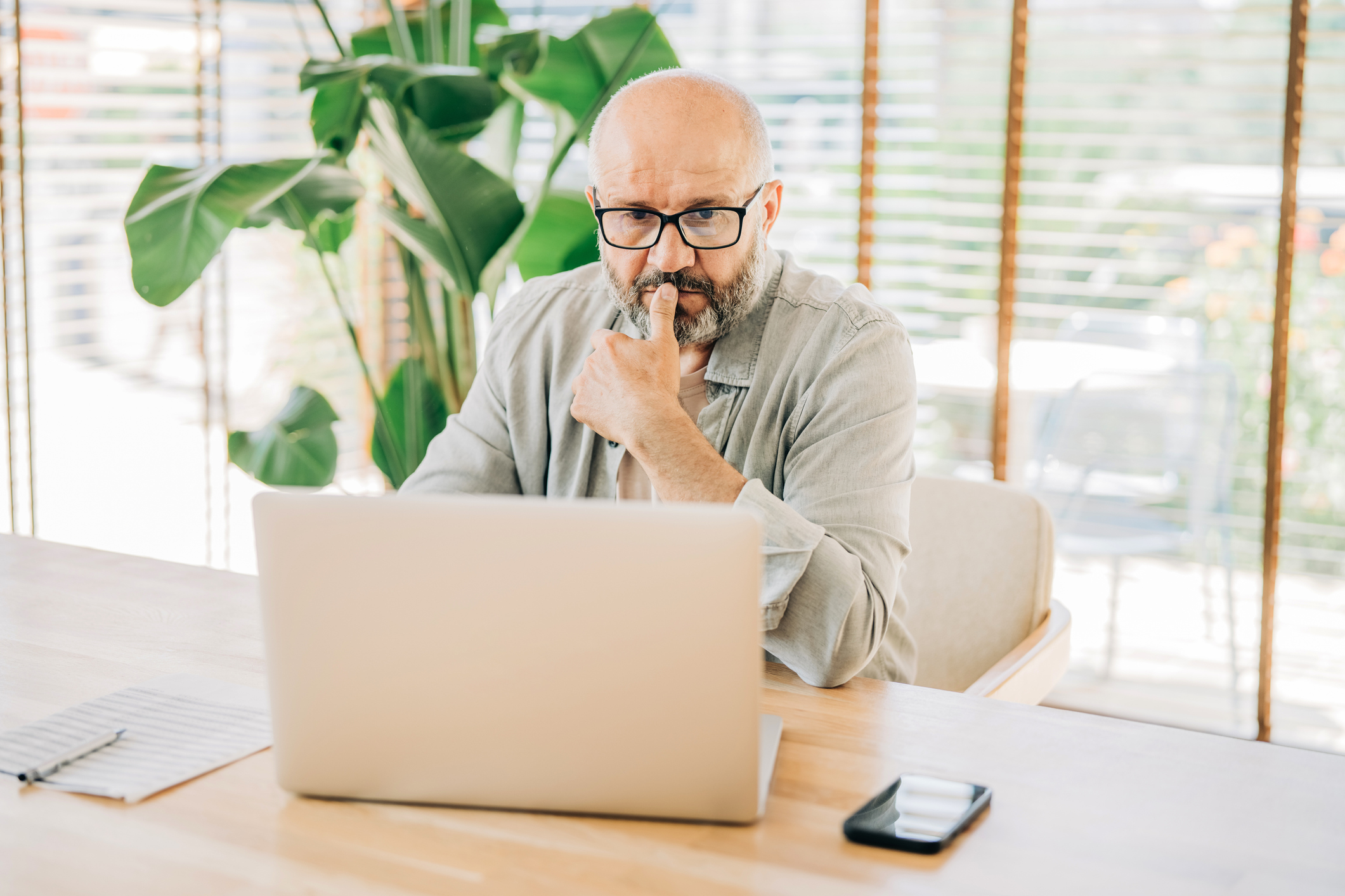 man looking at laptop