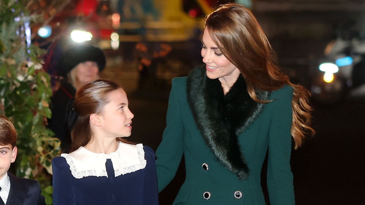 Princess Charlotte of Wales and Catherine, Princess of Wales look at each other as they arrive to attend the &#039;Together At Christmas&#039; Carol Service