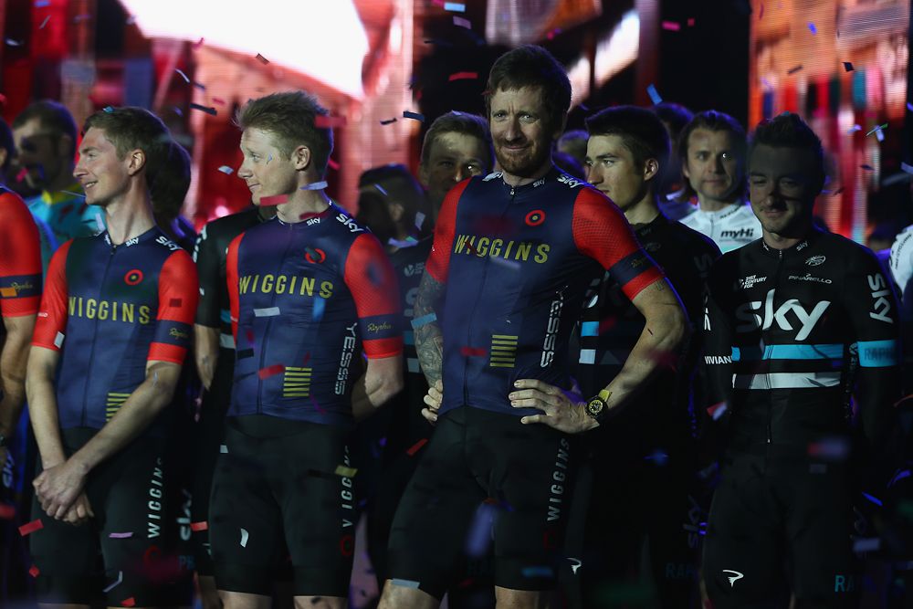 Sir Bradley Wiggins leader of Team Wiggins looks on as ticker tape falls during a team presentation show ahead of the Tour of Dubai.