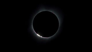 Bright beads of light are produced around the very edge of a solar eclipse just before totality.