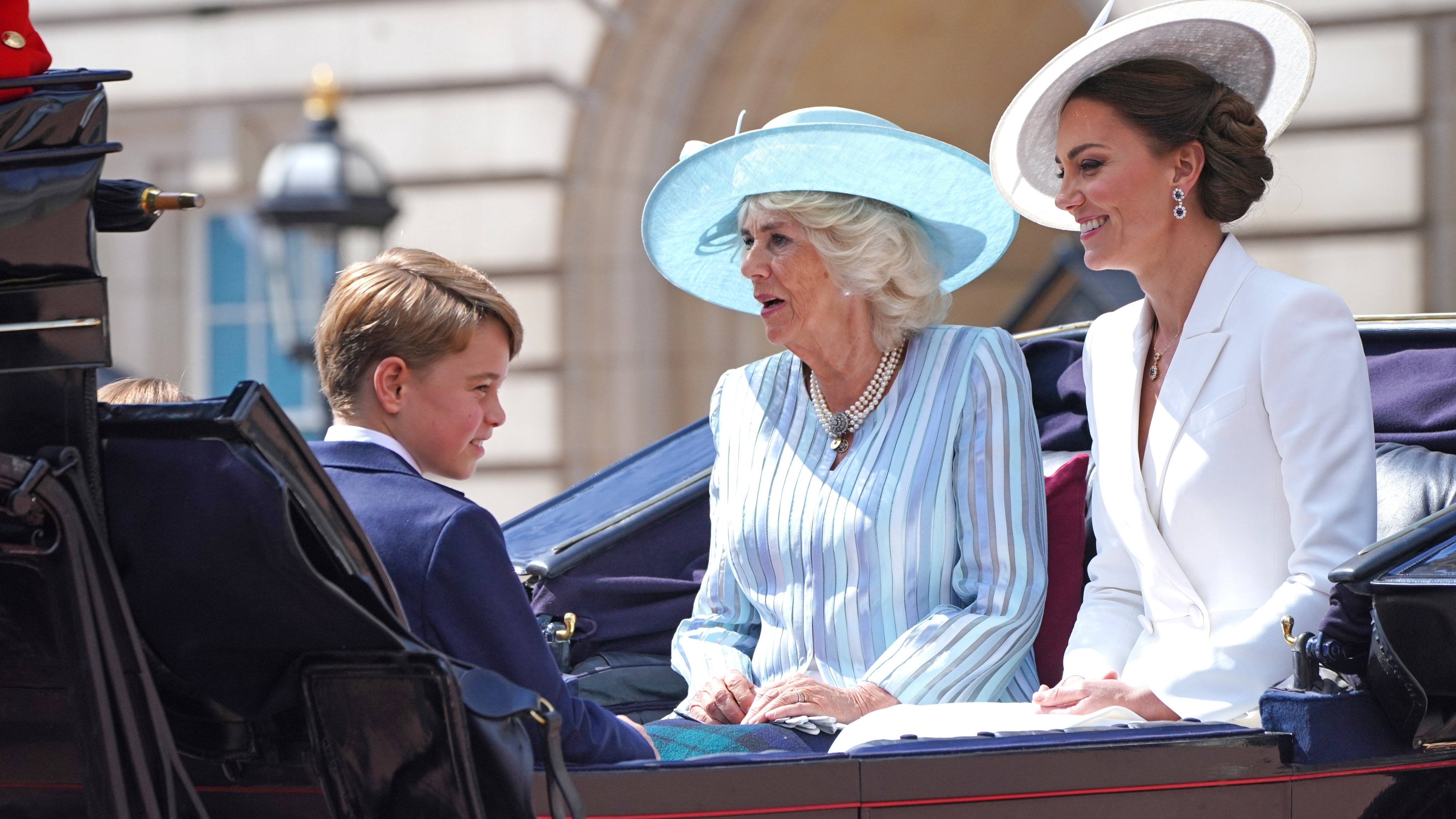Prince George, Queen Camilla and Kate Middleton ride in a carriage during the Trooping the Colour parade on June 02, 2022