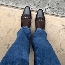 Flat black shoes with jeans