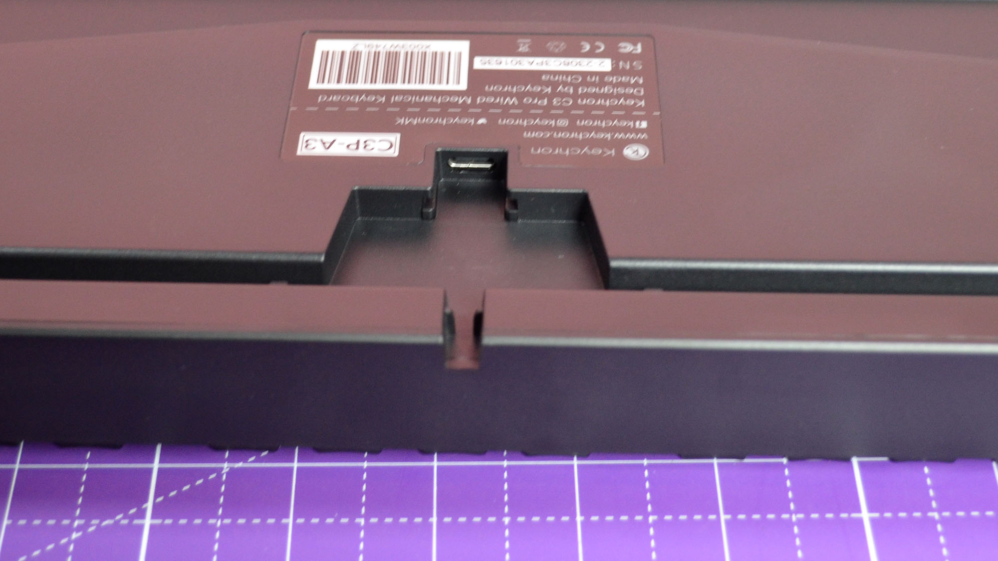 The Keychron C3 Pro on a purple deskmat