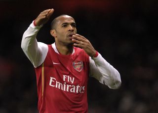 Thierry Henry celebrates scoring for Arsenal