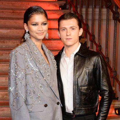 Zendaya and Tom Holland at a London photocall for "Spider-Man: No Way Replica Luxury Handbag" in 2021