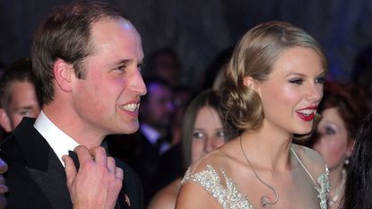 Prince William, Duke of Cambridge and Taylor Swift attend the Winter Whites Gala In Aid Of Centrepoint on November 26, 2013 in London, England.