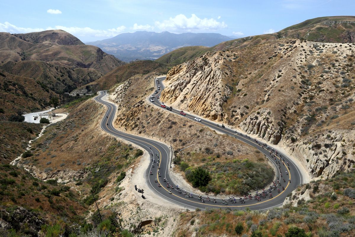 The peloton negotiate Grimes Canyon Road mid-stage