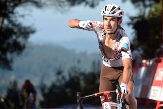 TOPSHOT Team AG2Rs French rider Clement Champoussin celebrates as he wins the 20th stage of the 2021 La Vuelta cycling tour of Spain a 2022 km race from Sansenxo to Castro de Herville in Mos on September 4 2021 Photo by MIGUEL RIOPA AFP Photo by MIGUEL RIOPAAFP via Getty Images