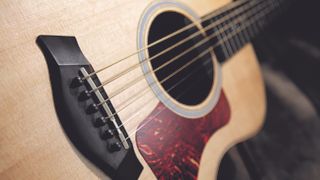 Close-up of a Taylor GS Mini acoustic guitar